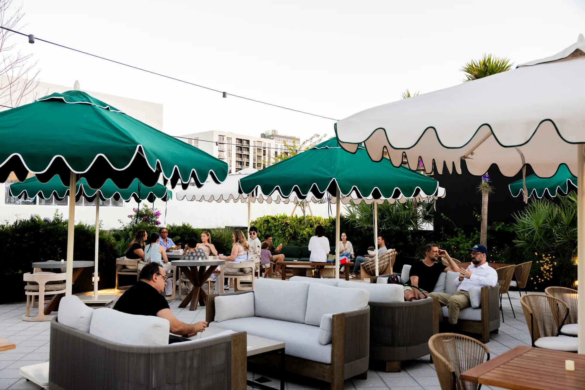 Guests gathering on Cotidiano’s Wynwood patio