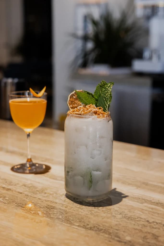 Two Cotidiano cocktails served at the bar